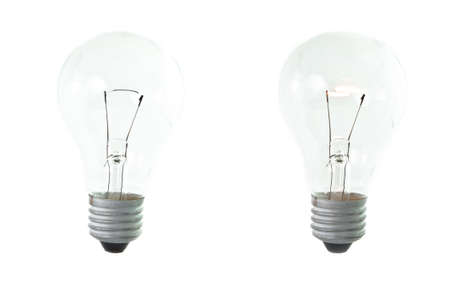 The usual glass lamp of an incandescence, the bulb is turned on  Isolated の写真素材