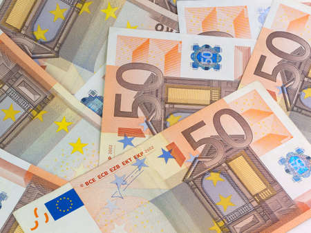 Heap from euro denominations on 50 eurosの写真素材