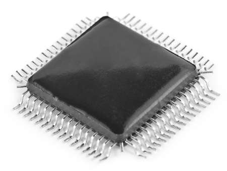 Isolated black microchip with a set of legsの写真素材