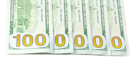 A pile of new isolated 2013 hundred dollar bills, isolated on white background with soft focusの写真素材