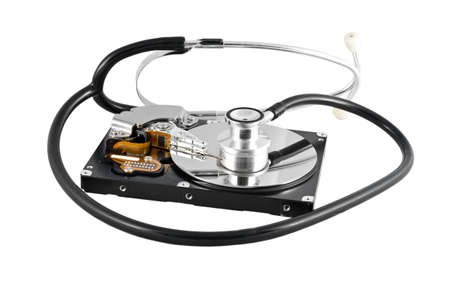Isolated stethoscope on the hard disk drive over whiteの写真素材