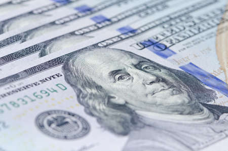 Macro shot of Benjamin Franklin 100 dollar bill, shallow depth of fieldの写真素材