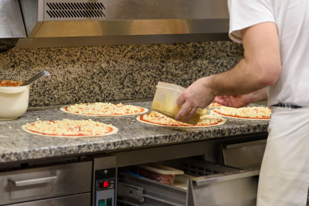 Several pieces of pizza on the table, shallow depth of field, soft focusの写真素材