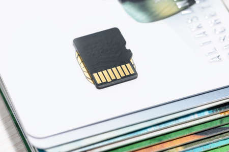 Micro SD memory card on Bank cards close-up, shallow depth of fieldの写真素材