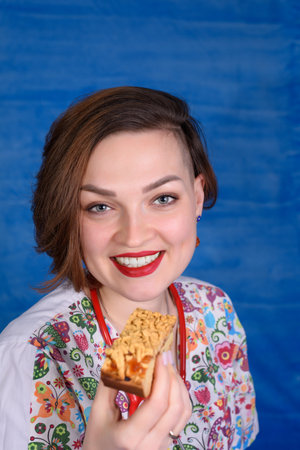 Photo of a pediatrician on a blue background with a stethoscopeの写真素材