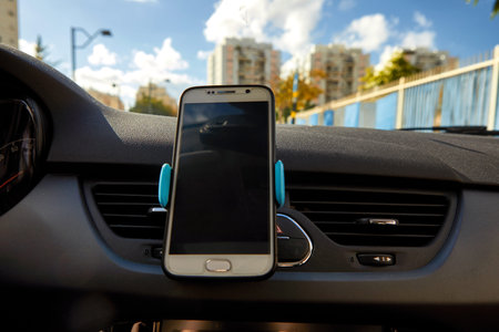 Universal mount holder for smart phones. Car dashboard or wind-shield holder bracket for mobile...