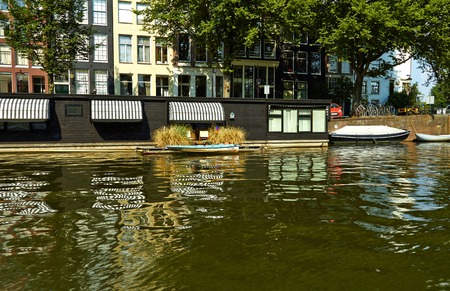 Canals and boats of Amsterdam. Holland July 2018のeditorial素材