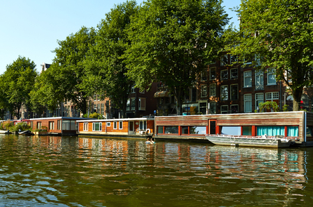 Canals and boats of Amsterdam. Holland July 2018の写真素材