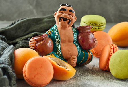 A figure of an oriental fruit seller in a bazaar. Concept of income and businessの写真素材