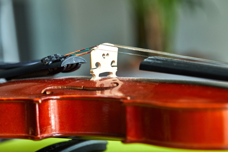 Close up shot of a violin,very soft def of field. Detail of violin.の写真素材