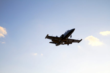 Private Aircraft landing on a blue sky background Israel