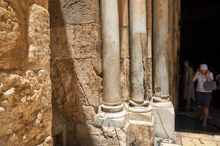 Jerusalem, Israel - July 10, 2019: Columns at the entrance to the Holy Sepulcher in Jerusalem. Is the most sacred place for all Christians in the world. Golgotha, Stone of Anointing, Graveのeditorial素材