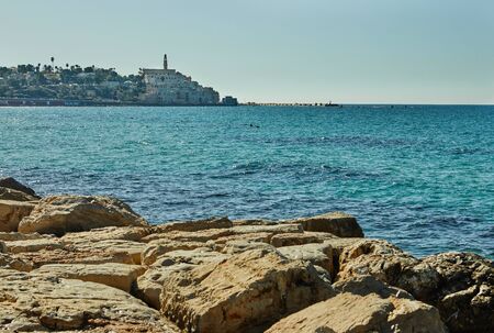 Mediterranean Sea overlooking the old port of Jaffa on a bright sunny November day.の写真素材