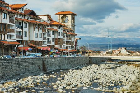 Bansko, Bulgaria - December 27, 2019: Ski resort center in Bulgaria. Cableway for climbing the mountain.のeditorial素材