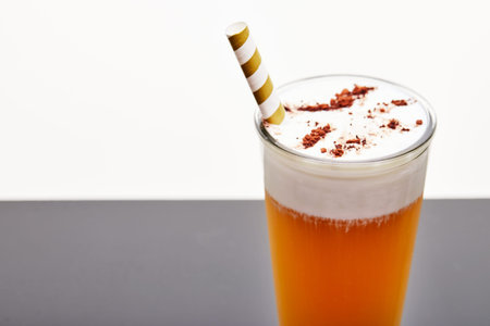 Fashionable food and drink glass of iced oolong tea also called Wulong or Wu Long with a layer of...