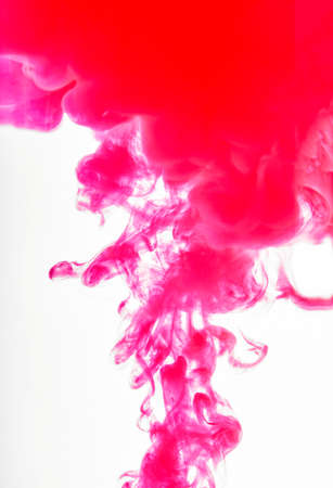 Colorful abstract painting Acrylic painting background texture in water creates an interesting abstraction on a white background. Spray in red colors.の写真素材