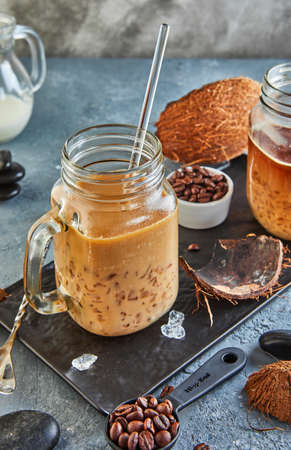 Thai Iced Coffee with Coconut Milk with Crushed Ice in a Mason Jar.の写真素材