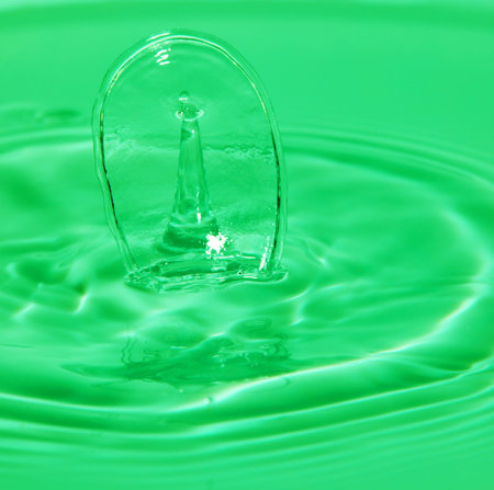 Abstract background of splash of color water, collision of colored drops, the concept art with...