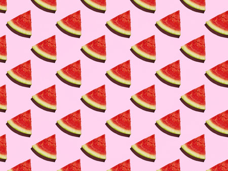 Slice of Mini Watermelon pattern on a pink background with a hard shadow.