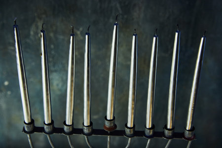 Jewish holiday Hanukkah background with menorah - traditional candelabra with candles.