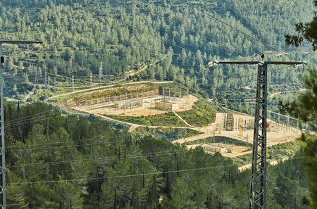 View from Sataf Park to the electrical substation surrounded by forest.