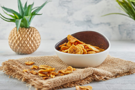 Banana chips healthy food, dry fruits and healthy vegetable chips, healthy vegan snacks on burlap...