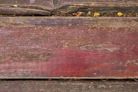 Texture of old wooden boards with peeling paint backgroundの写真素材