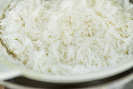 Cooked rice in bowl is ready for making chard pie. Step by step recipe.の写真素材