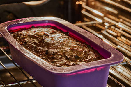 Bake the eggplant pie in silicone mold in electric ovenの写真素材