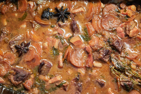 Beef casserole in beer with carrots and anise