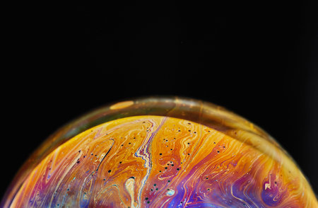 Virtual reality space with abstract multicolor psychedelic planet. Closeup Soap bubble like an alien...