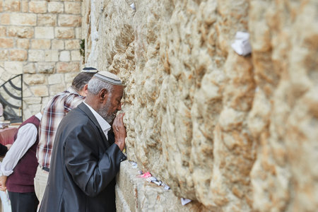 View of the Wailing Wall with worshipers, the shrine of the Jewish religion in Jerusalem.