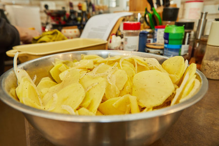 Chef prepares the ingredients for potato, zucchini, cauliflower and yellow cheese souffle.の写真素材