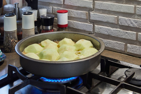 Tarte tatin, French apple pie in skillet on gas stoveの写真素材