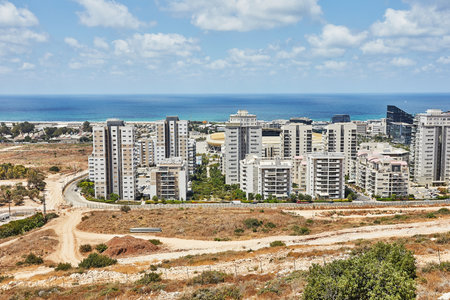 View of the Naot Peres district of Haifa, the stadium and the sea coastの写真素材