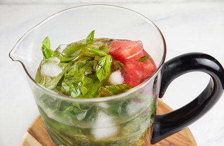 Refreshing summer drink made from watermelon, mint and ice in carafeの写真素材