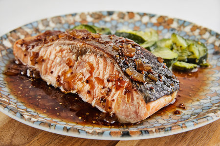 Salmon chunks glazed with beer and maple syrupの写真素材