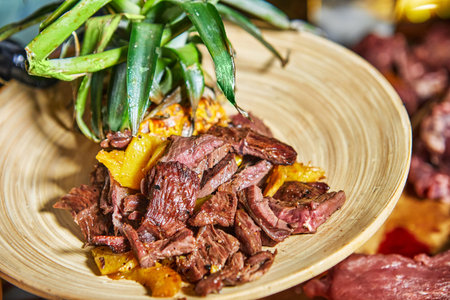 Grilled meat served on a decorative plate, exuding tropical flavors and a rustic presentation.