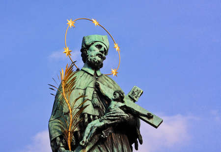 The statue on the Charles bridge in Pragueの写真素材