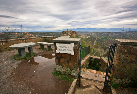 Grotto near the city-castle on the rock Civita-di-Bagnoredgio in Italyのeditorial素材