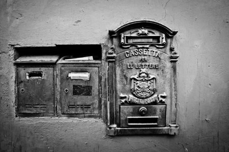 Black and white retro letterboxes in Rome