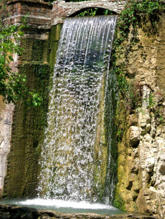 Waterfall in the mountainsの写真素材