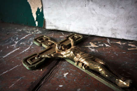 GLABBEEK, BELGIUM -NOV 05,2015: Abandoned villa. Crucifix above the fireplaceのeditorial素材