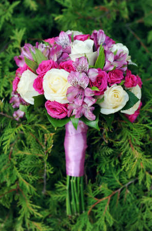 wedding bouquet on the grassの写真素材