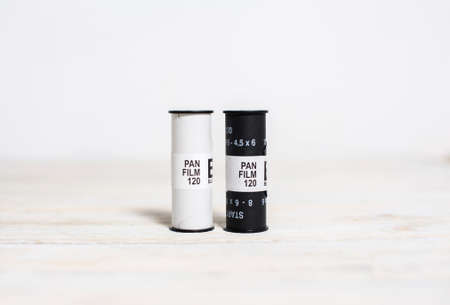 Medium format film on a white background. Retro equipmentの写真素材