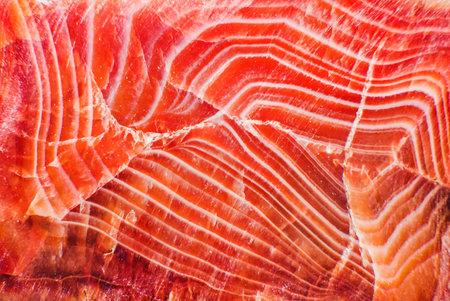 Abstract texture, semiprecious red stone, close up, macro