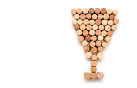 Many wine corks in the shape of a glass on a white backgroundの写真素材
