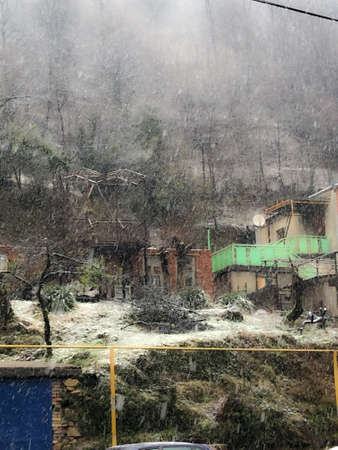 View of the village in the mountains from the train window.
Heavy summer rain, drops flowing down the window, mountains covered in fog - this is all an unbelievable journey along the Georgian railwayの写真素材
