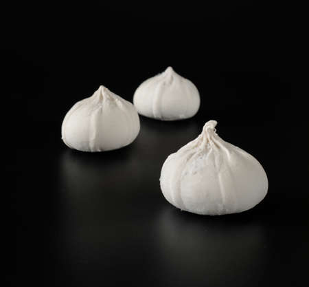 Khinkali with raw dough, on a black backgroundの写真素材