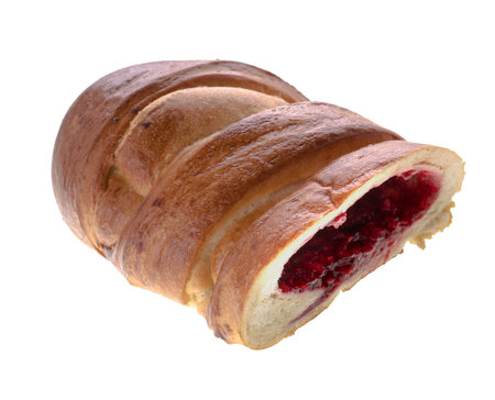 Piece of Rosy Bun with raspberry filling, confection, on white background isolated